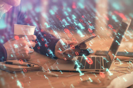 Multi exposure of mans hands holding and using a digital device and data theme drawing. Innovation...
