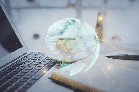 Double exposure of social network drawing and desktop with coffee and items on table background. Concept of international connection.の写真素材