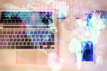 Multi exposure of forex graph drawing over desktop background with computer. Concept of financial analysis. Top view.の写真素材