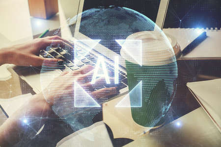 Double exposure of woman hands working on computer and data theme hologram drawing. Tech concept.