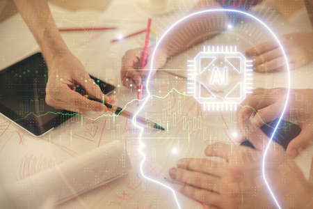 Double exposure of man and woman working together holding and using a mobile device and brain hologram drawing.の写真素材