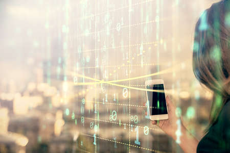 Double exposure of technology sketch hologram and woman holding and using a mobile device.