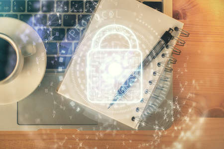 Double exposure of lock sketch and table top veiw. Concept of data security.の写真素材