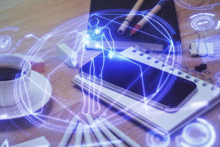 Double exposure of education theme drawing and cell phone background.の写真素材