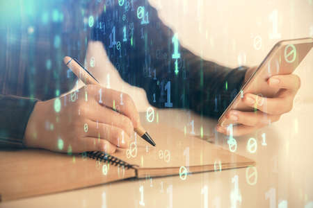Double exposure of technology sketch hologram and woman holding and using a mobile device.