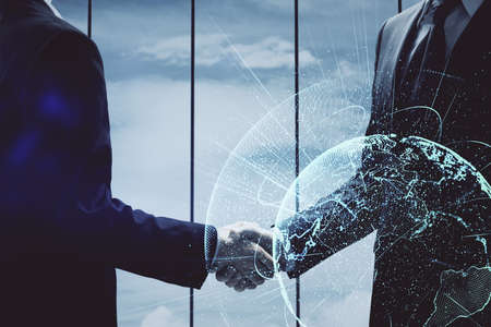 Double exposure of social network theme hologram and handshake of two men.の写真素材