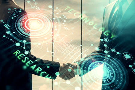 Double exposure of data theme hologram and handshake of two men. Partnership in IT industry concept.