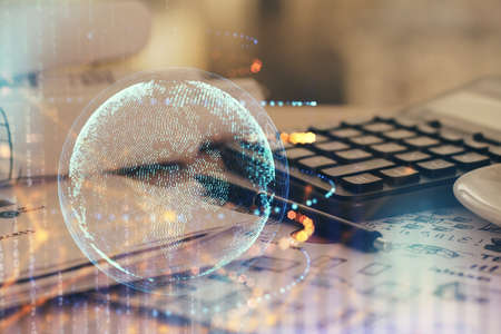 Multi exposure of world map drawings and desk with open notebook background. Concept of globolizationの写真素材