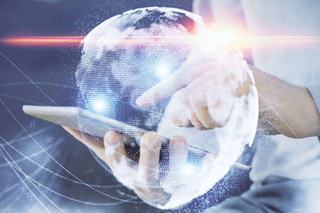 Double exposure of mans hands holding and using a phone and international business theme drawing.の写真素材