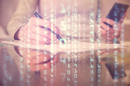 Double exposure of technology sketch hologram and woman holding and using a mobile device.の写真素材