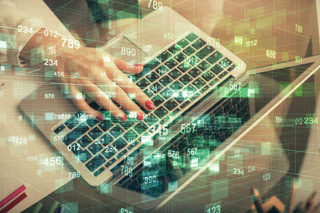 Multi exposure of woman hands working on computer and data theme hologram drawing. Tech concept.