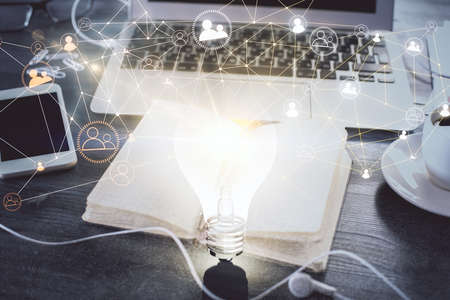 Double exposure of social network theme drawings and desk with open notebook background. Concept of people connectionの写真素材
