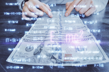 Multi exposure of Formulas drawing hologram and USA dollars bills and man hands. Education