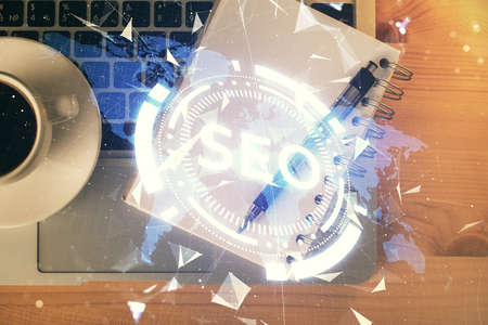 Double exposure of SEO drawing and table top veiw. Concept of search optimization.の写真素材