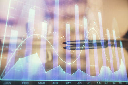 Double exposure of forex chart over coffee cup background in office. Concept of financial analysis and success.の写真素材