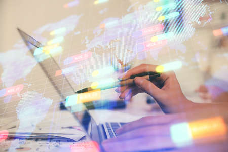 Multi exposure of woman hands working on computer and data theme hologram drawing. Tech concept.