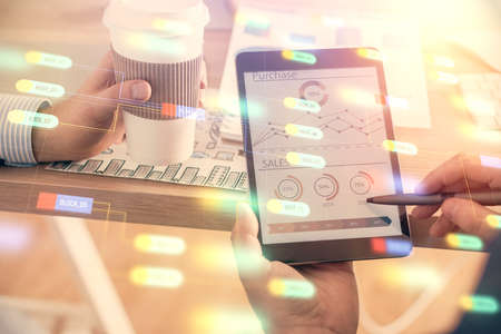 Multi exposure of mans hands holding and using a digital device and data theme drawing. Innovation concept.の写真素材