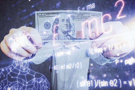 Multi exposure of Formulas drawing hologram and USA dollars bills and man hands. Education