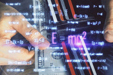 Multi exposure of Formulas drawing hologram and USA dollars bills and man hands. Education