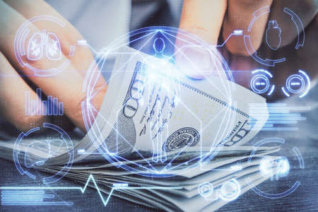 Multi exposure of education theme drawing hologram and USA dollars bills and man hands.