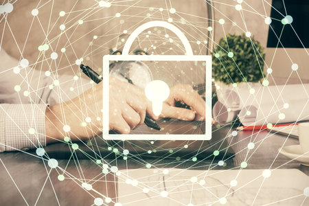 Multi exposure of mans hands holding and using a digital device and lock drawing. Security concept.