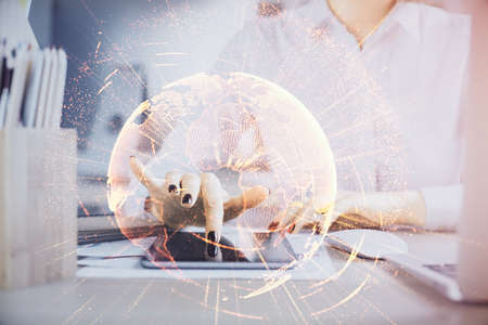 Double exposure of social network sketch hologram and woman holding and using a mobile device.