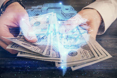 Multi exposure of brain drawing hologram and us dollars bills and man hands. Ai invest conceptの写真素材