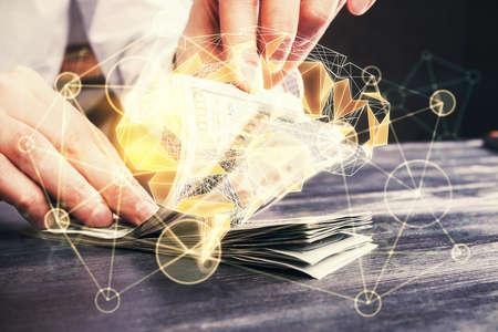 Multi exposure of brain drawing hologram and us dollars bills and man hands. Ai invest conceptの写真素材