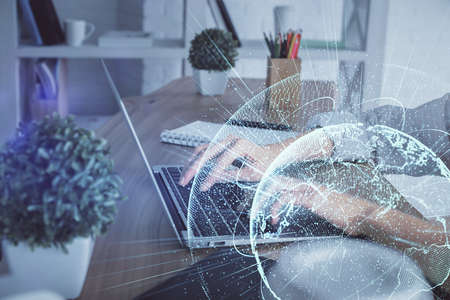 Double exposure of woman hands typing on computer and social network theme hologram drawing. People media concept.の写真素材