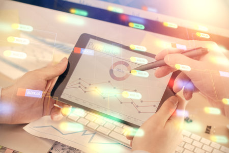 Multi exposure of mans hands holding and using a digital device and data theme drawing. Innovation concept.の写真素材