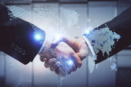 Double exposure of social network theme hologram and handshake of two men.