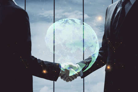 Double exposure of social network theme hologram and handshake of two men.の写真素材