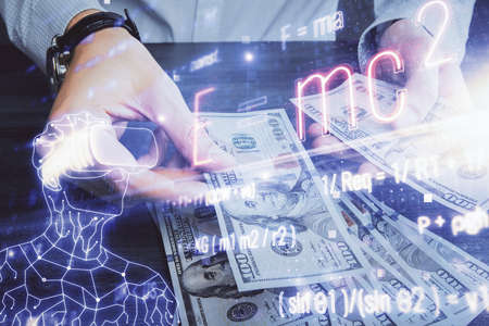 Multi exposure of Formulas drawing hologram and USA dollars bills and man hands. Education