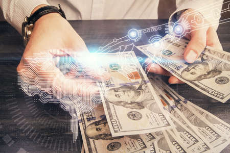 Multi exposure of brain drawing hologram and us dollars bills and man hands. Ai invest conceptの写真素材