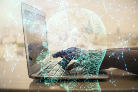 Multi exposure of woman hands working on computer and brain hologram drawing. Ai concept.の写真素材
