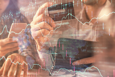 Double exposure of man and woman on-line shopping holding a credit card and forex graph hologram...