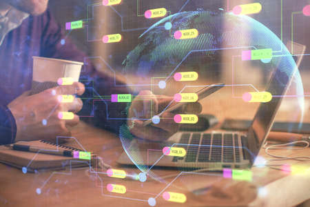 Multi exposure of mans hands holding and using a digital device and data theme drawing. Innovation...