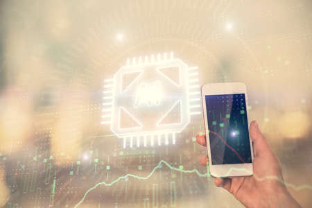 Double exposure of technology sketch hologram and woman holding and using a mobile device.