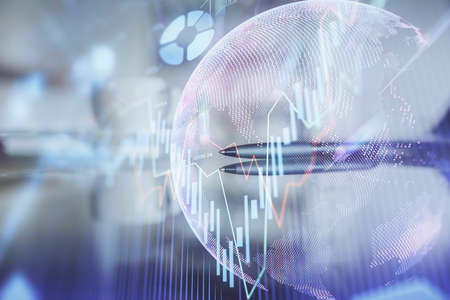 Double exposure of forex chart over coffee cup background in office. Concept of financial analysis and success.の写真素材