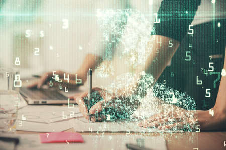 Double exposure of woman hands working on computer and data theme hologram drawing. Tech concept.