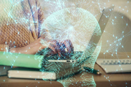 Multi exposure of woman hands working on computer and brain hologram drawing. Ai concept.
