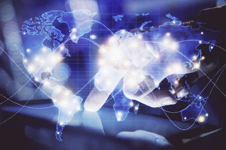 Double exposure of mans hands holding and using a phone and international business theme drawing.の写真素材
