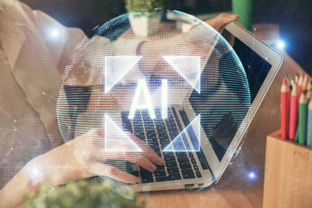 Double exposure of woman hands working on computer and data theme hologram drawing. Tech concept.の写真素材