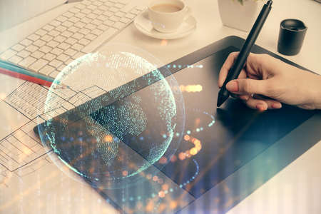 Double exposure of map sketch hologram and woman holding and using a mobile device.の写真素材