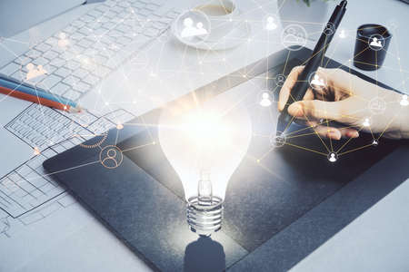 Double exposure of social network sketch hologram and woman holding and using a mobile device.の写真素材