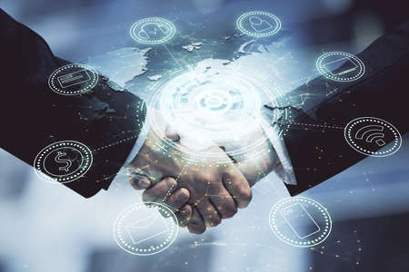Double exposure of social network theme hologram and handshake of two men.の写真素材