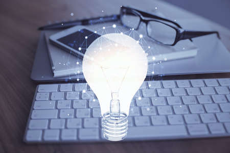 Double exposure of bulb drawing and cell phone background. Concept of ideaの写真素材