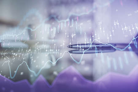 Double exposure of forex chart over coffee cup background in office. Concept of financial analysis and success.の写真素材