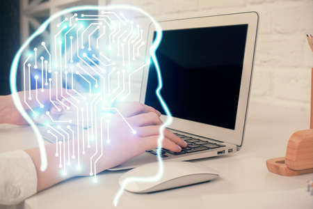 Multi exposure of woman hands working on computer and brain hologram drawing. Ai concept.の写真素材