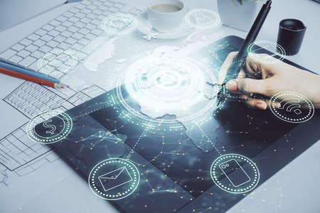 Double exposure of social network sketch hologram and woman holding and using a mobile device.の写真素材